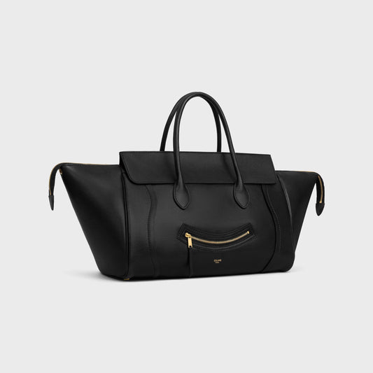 Cuero | SMILE LUGGAGE IN SUPPLE SHINY LAMBSKIN