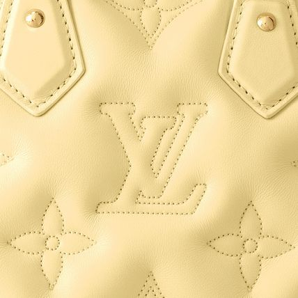 Cuero | Banane' bubblegram Alma BB bag with detachable strap & gold metallic hardware