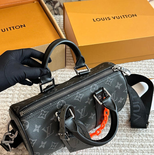 Cuero | Signature Monogram Duffle Crossbody Bag - Eclipse Black with Neon Chain