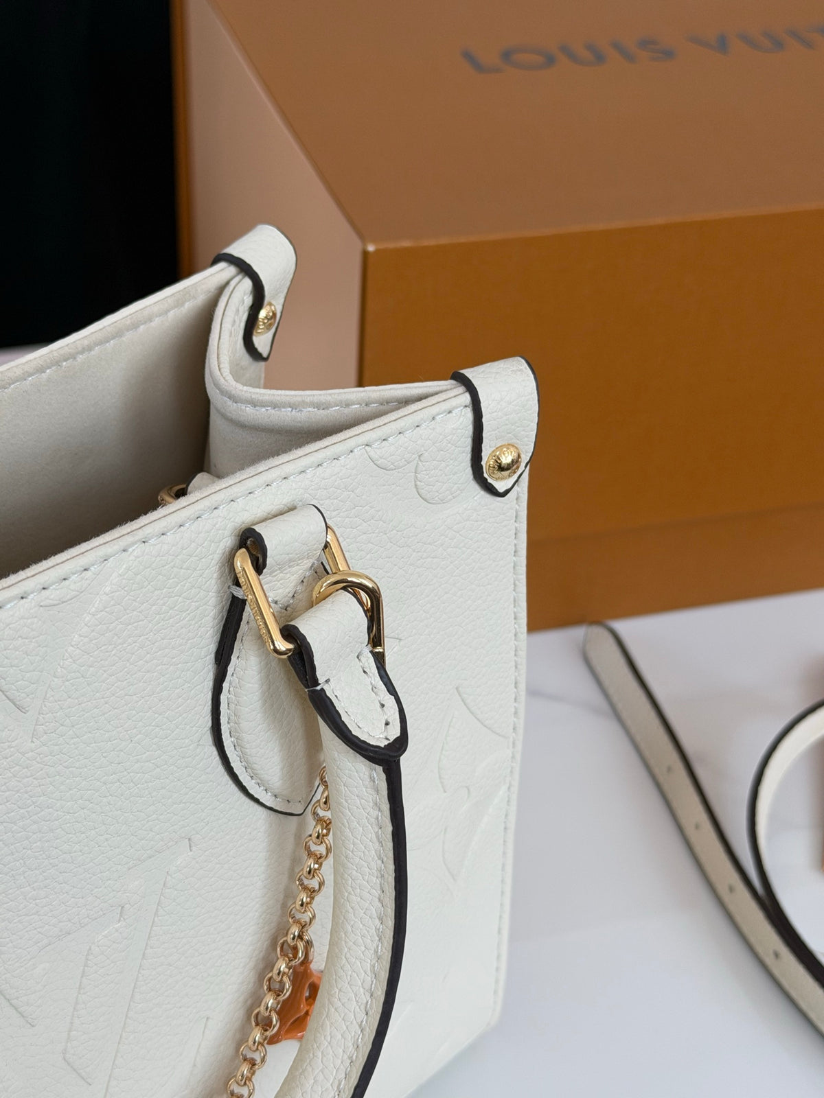 Cuero | Embossed Monogram Charm Chain Tote Bag - Cream White