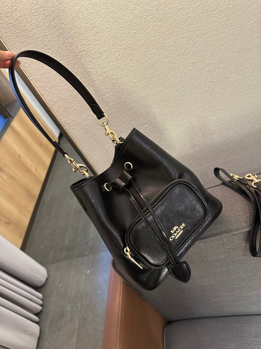 Cuero | Pebbled Leather Drawstring Bucket Bag with Front Pocket - Black
