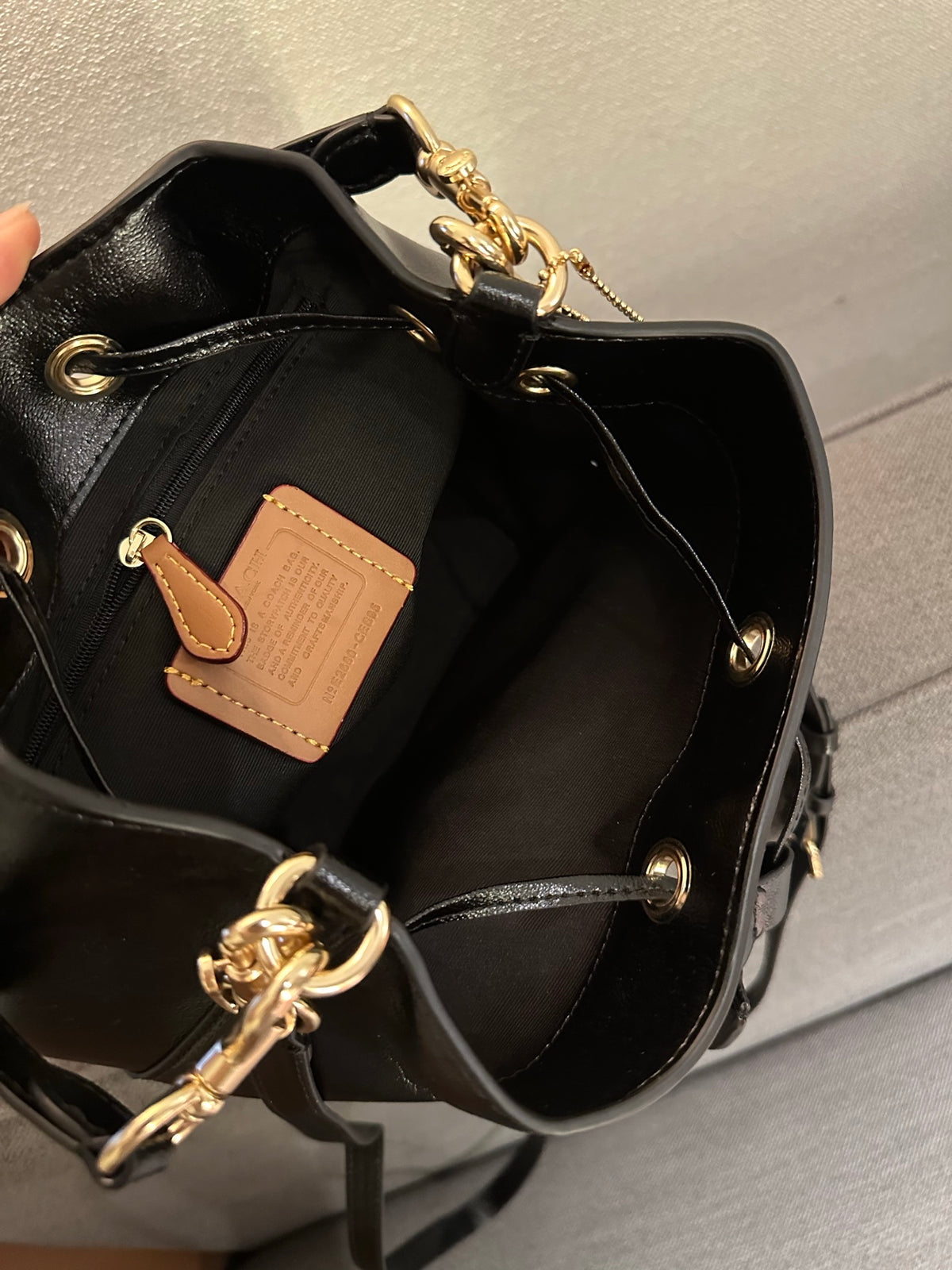 Cuero | Pebbled Leather Drawstring Bucket Bag with Front Pocket - Black
