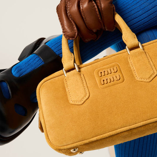 Cuero | Arcadie padded suede top-handle bag in Whiskey