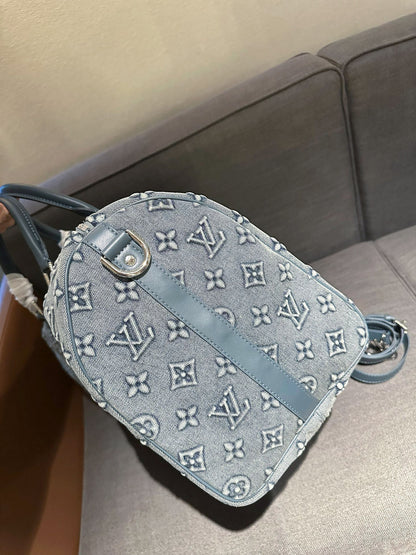 Cuero | Monogram Denim Boston Duffle Bag - Washed Grey Blue
