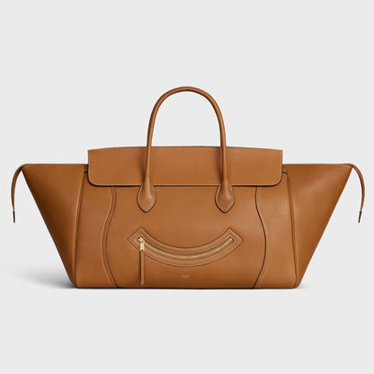 Cuero | SMILE LUGGAGE IN SUPPLE SHINY LAMBSKIN
