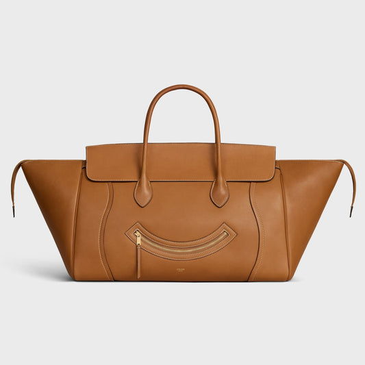 Cuero | SMILE LUGGAGE IN SUPPLE SHINY LAMBSKIN