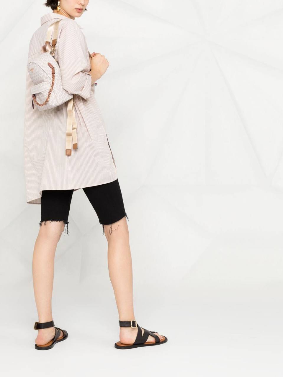 Cuero | Small Rhea Monogram print backpack in offwhite