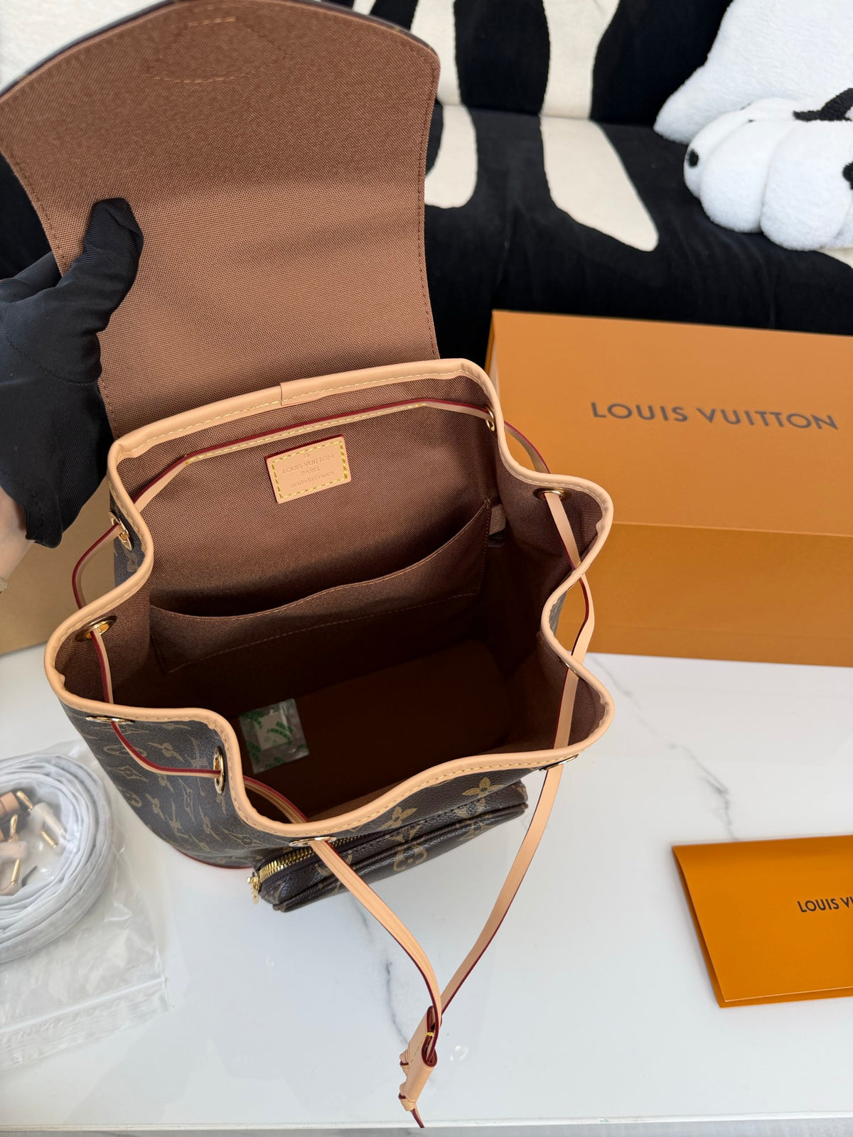 Cuero | Signature Monogram Drawstring Backpack - Brown Monogram