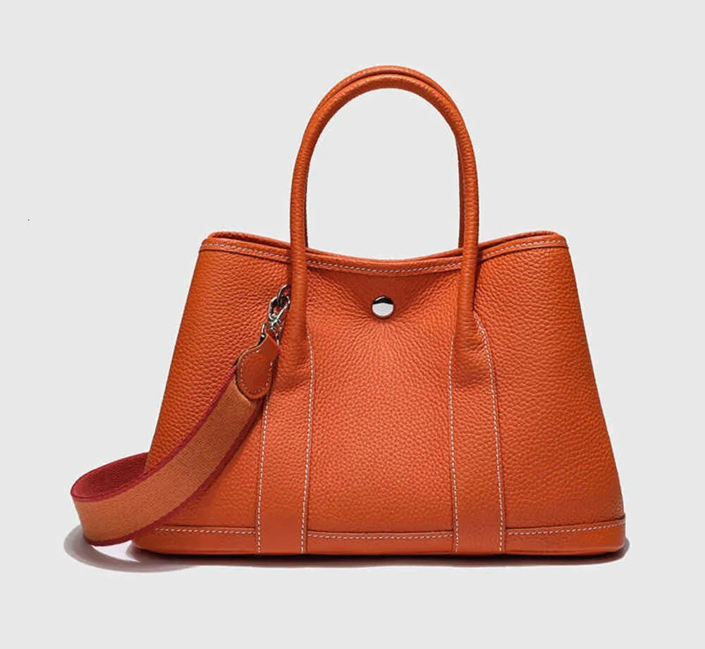 Cuero | Garden Orange Silver hardware K stamp