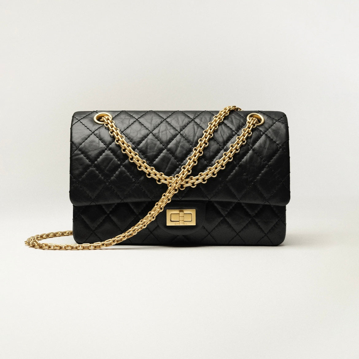 Cuero | Aged Calfskin & Gold-Tone Metal Black