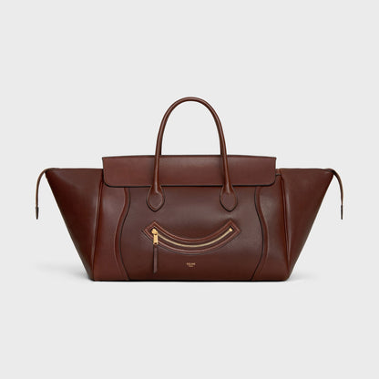 Cuero | SMILE LUGGAGE IN SUPPLE SHINY LAMBSKIN