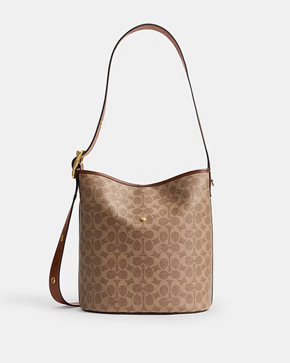 Cuero | BLEECKER BUCKET BAG IN SIGNATURE CANVAS