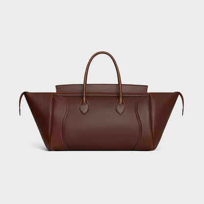 Cuero | SMILE LUGGAGE IN SUPPLE SHINY LAMBSKIN