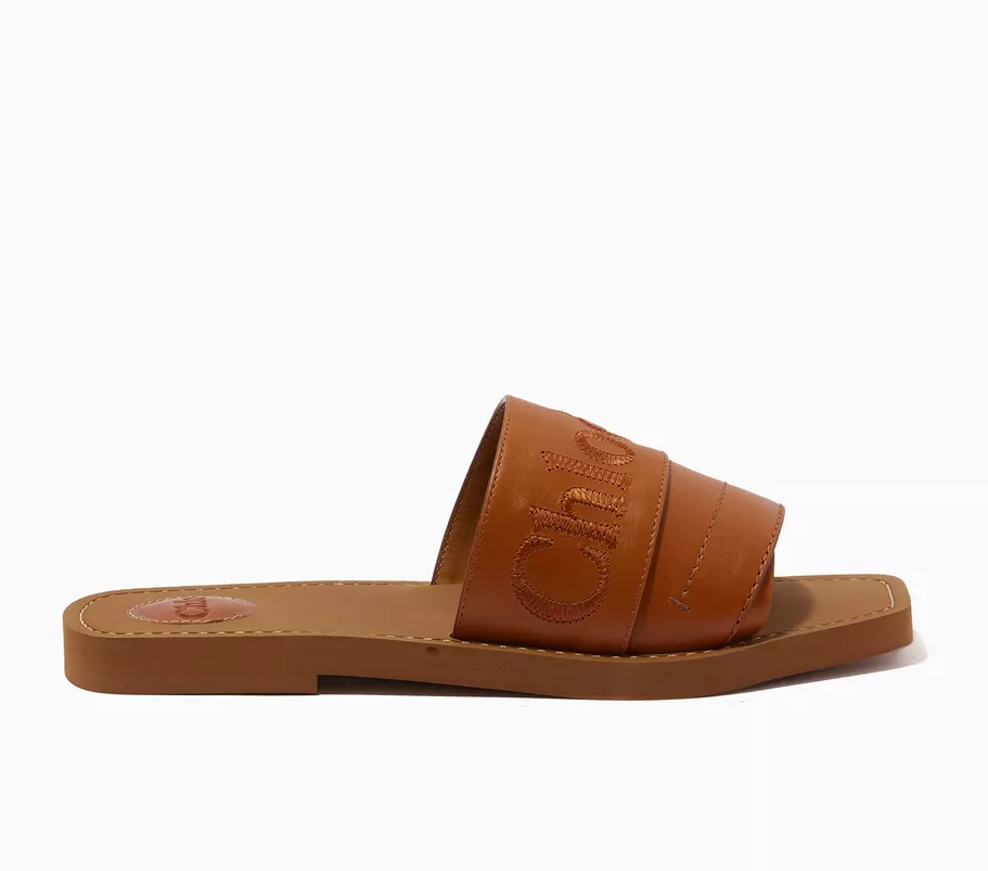Cuero | Woody Logo Slide Sandals in Calfskin