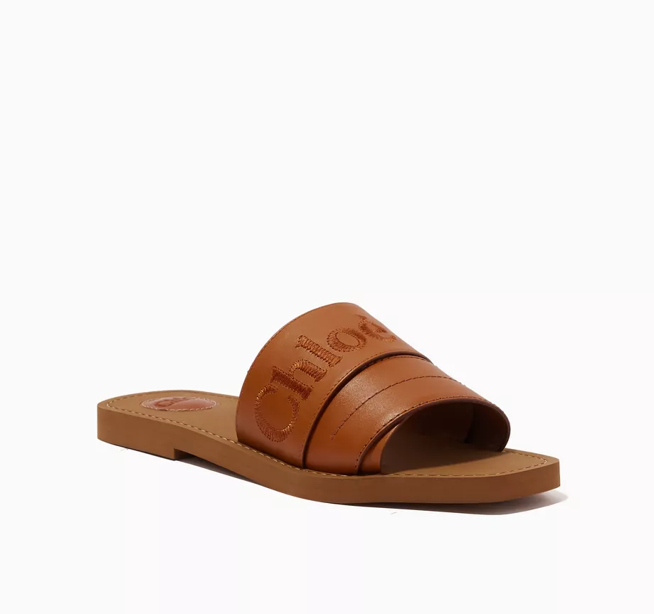 Cuero | Woody Logo Slide Sandals in Calfskin