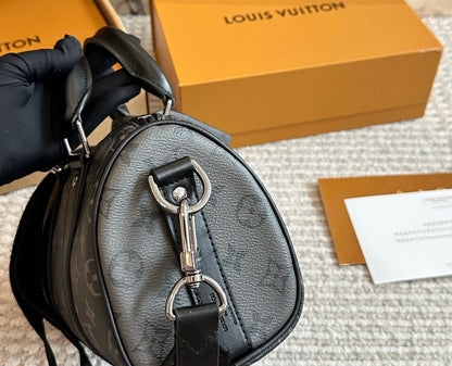 Cuero | Signature Monogram Duffle Crossbody Bag - Eclipse Black with Neon Chain
