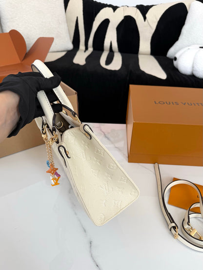 Cuero | Embossed Monogram Charm Chain Tote Bag - Cream White