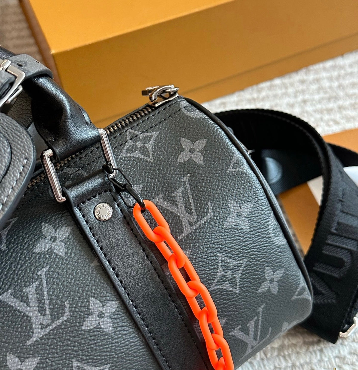Cuero | Signature Monogram Duffle Crossbody Bag - Eclipse Black with Neon Chain