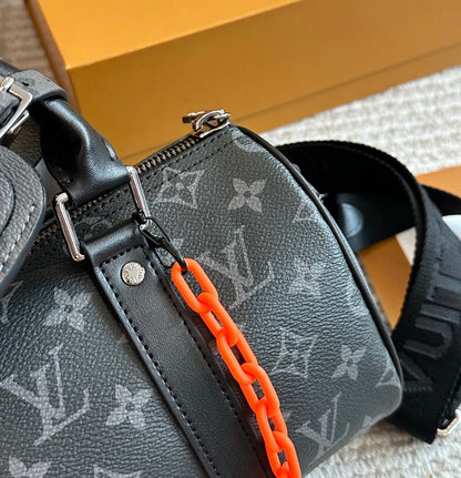 Cuero | Signature Monogram Duffle Crossbody Bag - Eclipse Black with Neon Chain