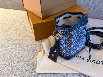 Cuero | Monogram Jacquard Mini Bucket Bag