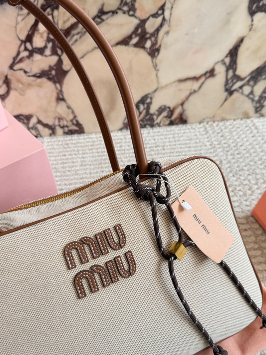 Cuero | Canvas & Leather Barrel Shoulder Bag