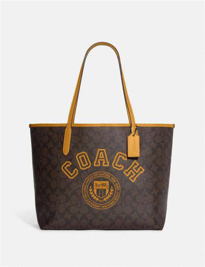Cuero | City Tote In Signature Canvas With Varsity Motif In Yellow