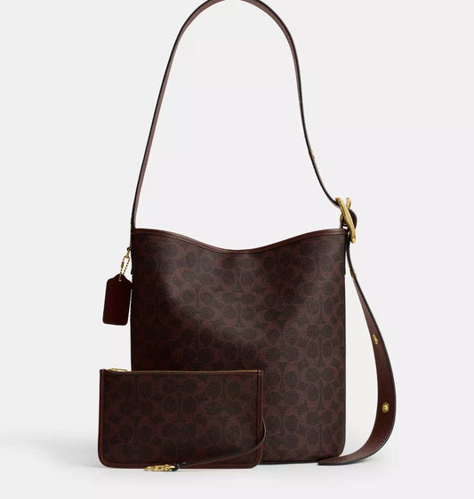 Cuero | BLEECKER BUCKET BAG IN SIGNATURE CANVAS