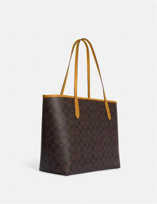 Cuero | City Tote In Signature Canvas With Varsity Motif In Yellow