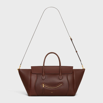 Cuero | SMILE LUGGAGE IN SUPPLE SHINY LAMBSKIN