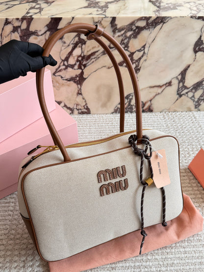 Cuero | Canvas & Leather Barrel Shoulder Bag