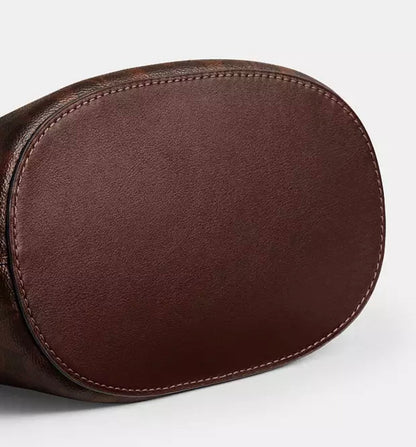 Cuero | BLEECKER BUCKET BAG IN SIGNATURE CANVAS