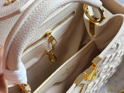 Cuero | Embossed Monogram Top-Handle Bag