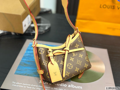 Cuero | Signature Monogram Mini Bow Crossbody Bag - Brown Monogram