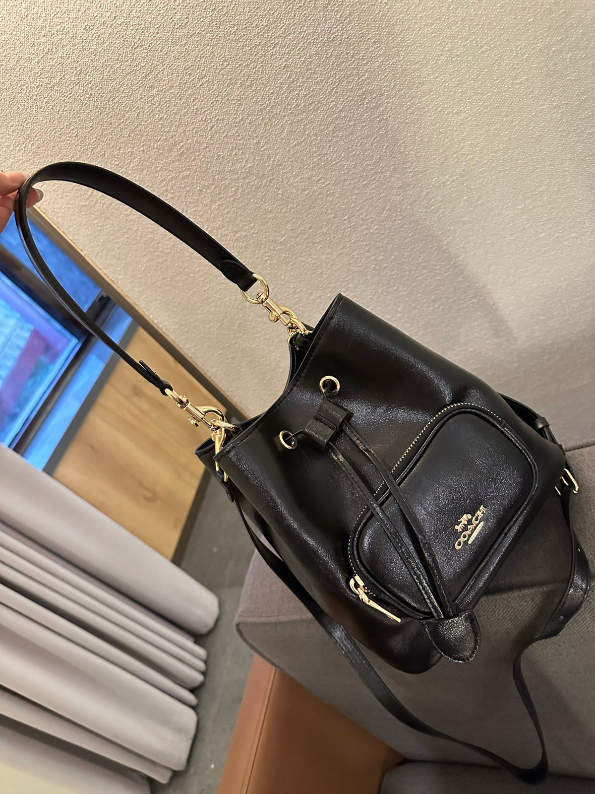 Cuero | Pebbled Leather Drawstring Bucket Bag with Front Pocket - Black