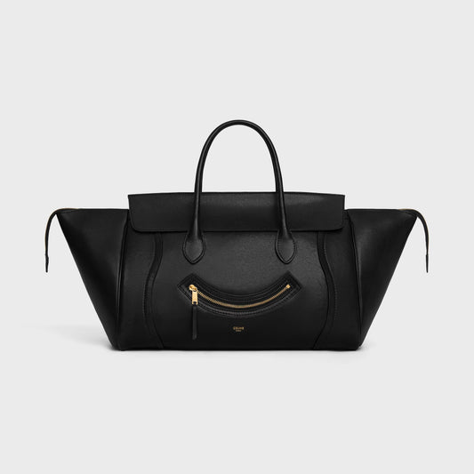 Cuero | SMILE LUGGAGE IN SUPPLE SHINY LAMBSKIN