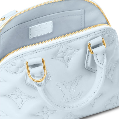 Cuero | VUITTON Banane' bubblegram Alma BB bag with detachable strap & gold metallic hardware