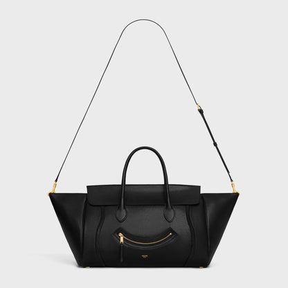 Cuero | SMILE LUGGAGE IN SUPPLE SHINY LAMBSKIN