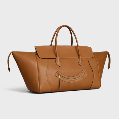 Cuero | SMILE LUGGAGE IN SUPPLE SHINY LAMBSKIN