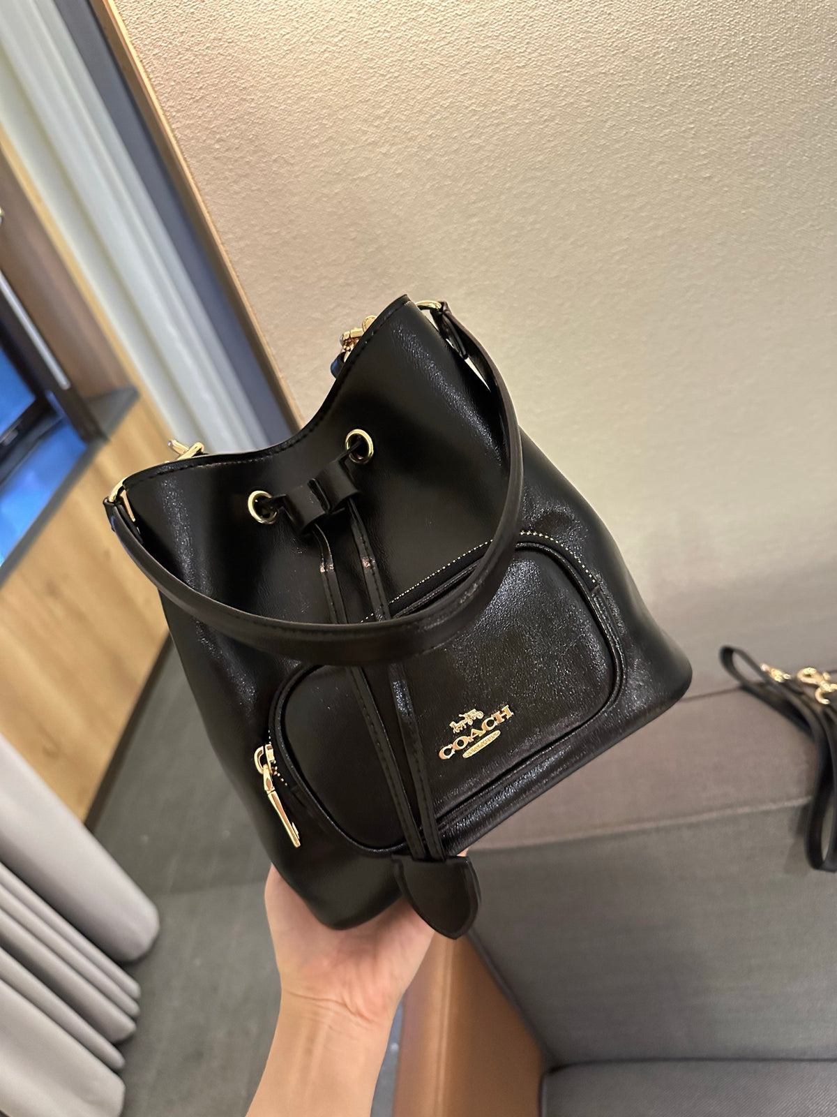 Cuero | Pebbled Leather Drawstring Bucket Bag with Front Pocket - Black