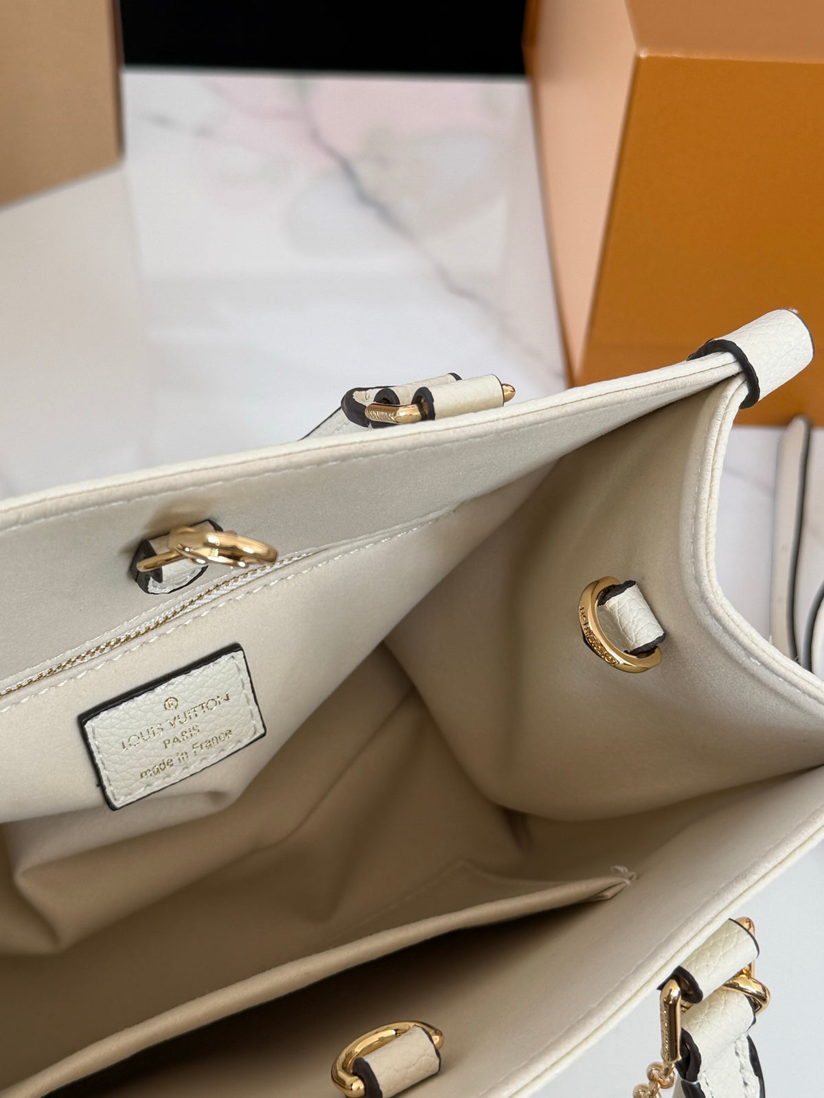 Cuero | Embossed Monogram Charm Chain Tote Bag - Cream White