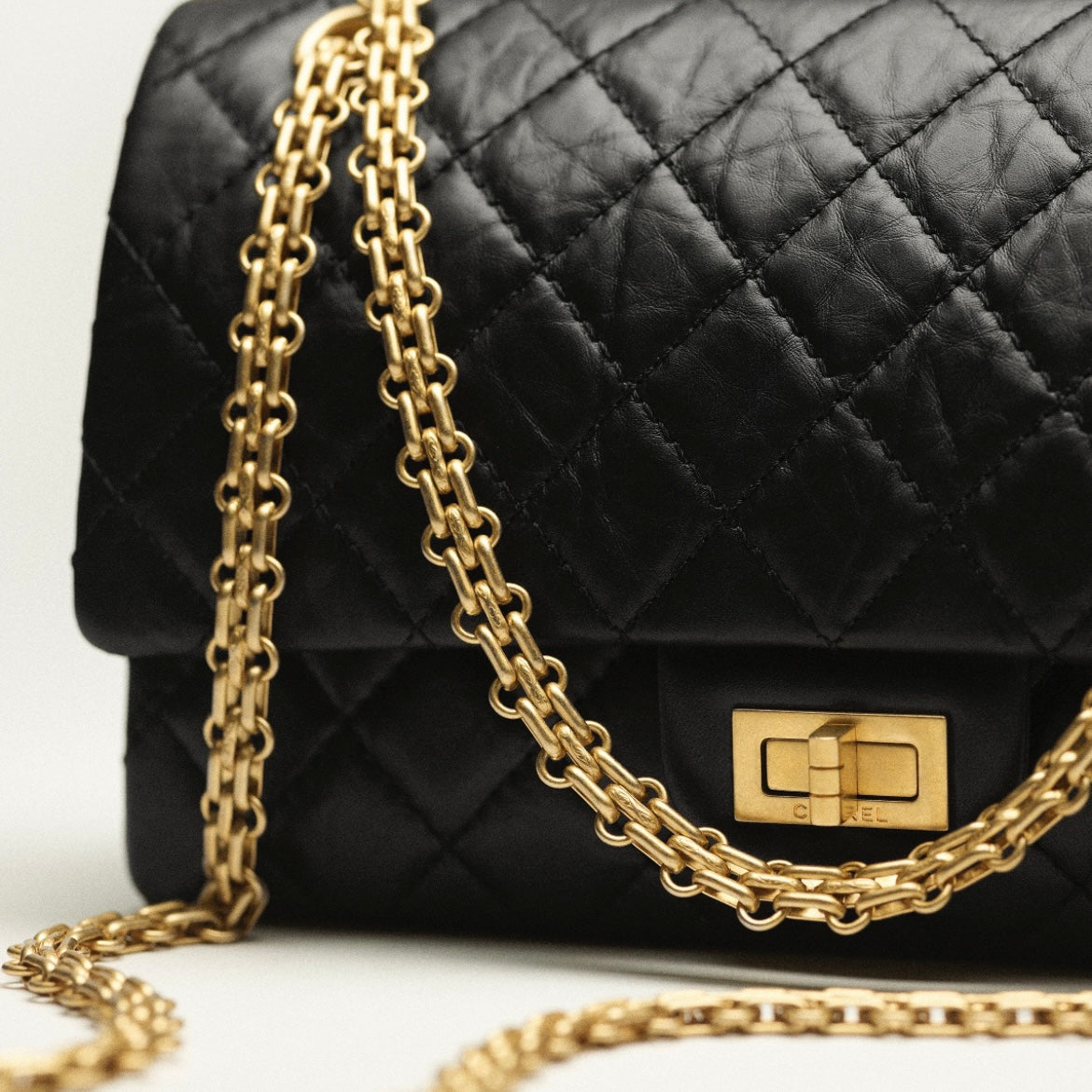 Cuero | Aged Calfskin & Gold-Tone Metal Black