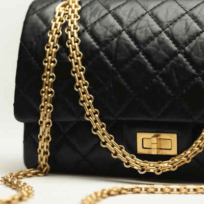 Cuero | Aged Calfskin & Gold-Tone Metal Black