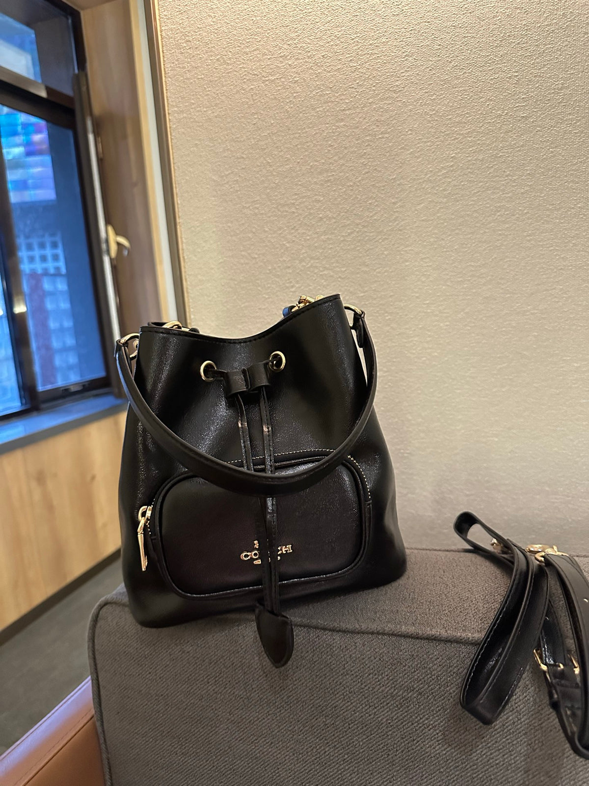 Cuero | Pebbled Leather Drawstring Bucket Bag with Front Pocket - Black