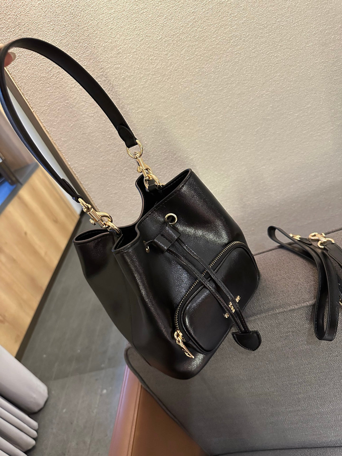 Cuero | Pebbled Leather Drawstring Bucket Bag with Front Pocket - Black