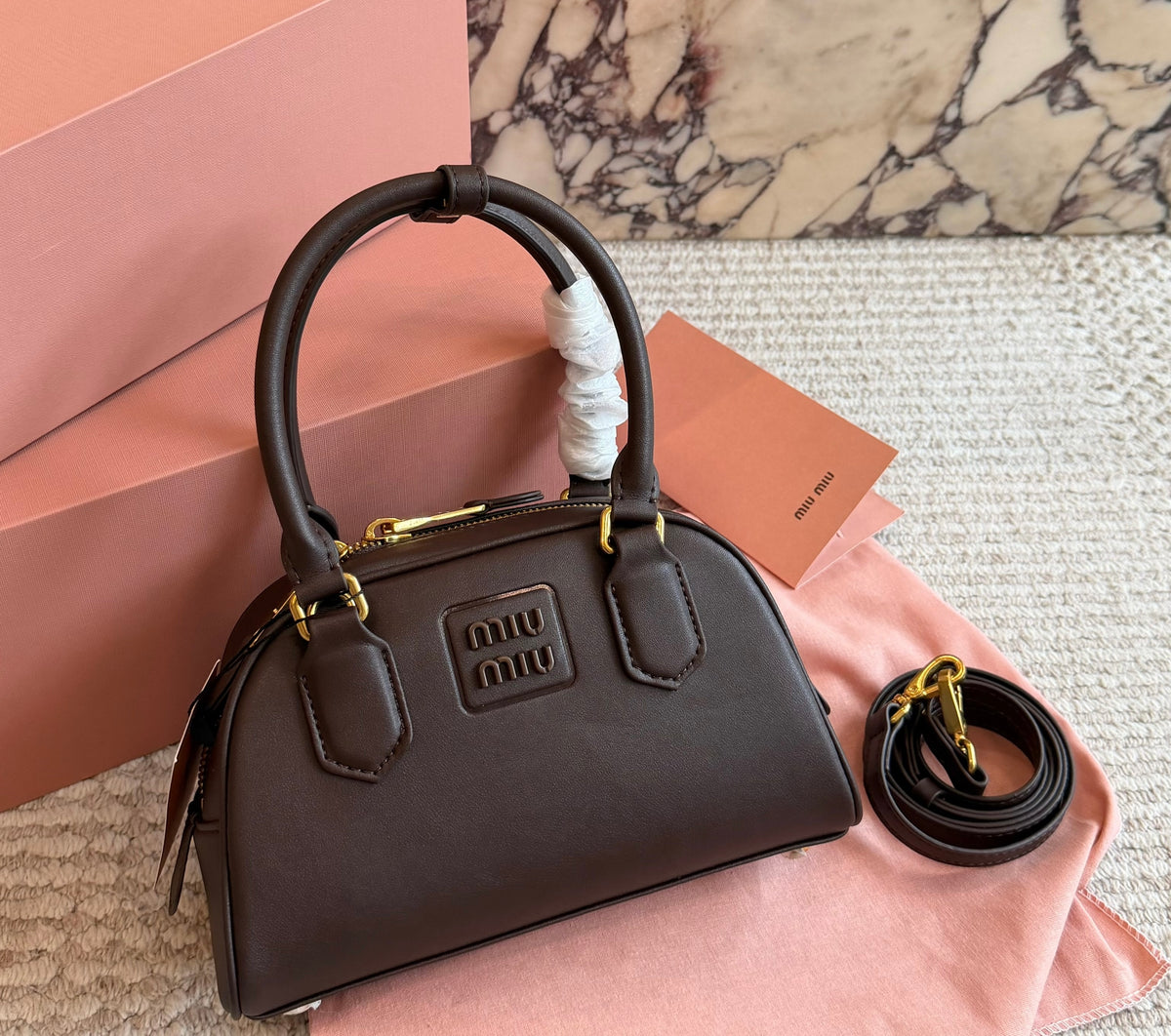 Cuero | Embossed Logo Mini Dome Bag