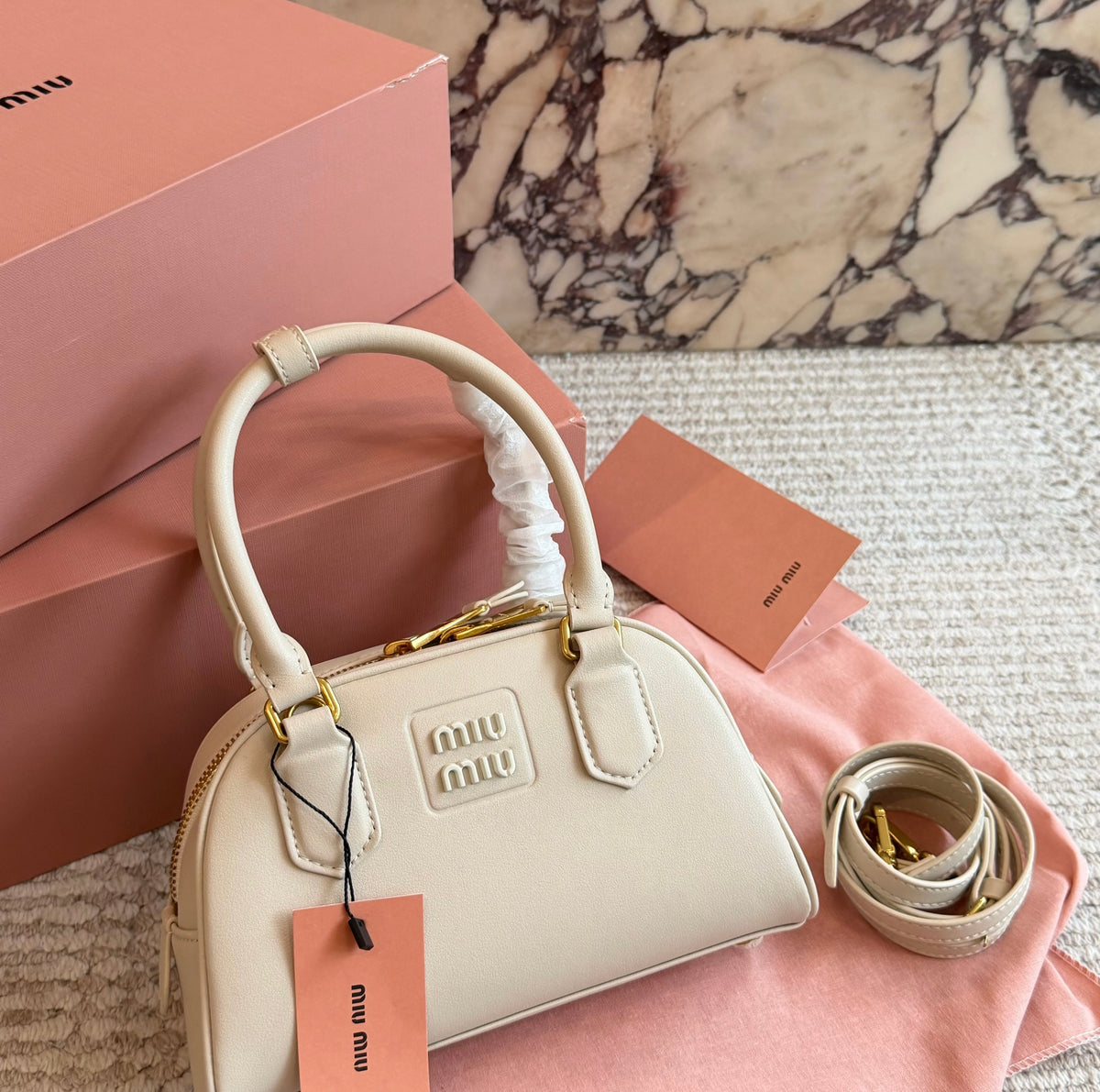 Cuero | Embossed Logo Mini Dome Bag