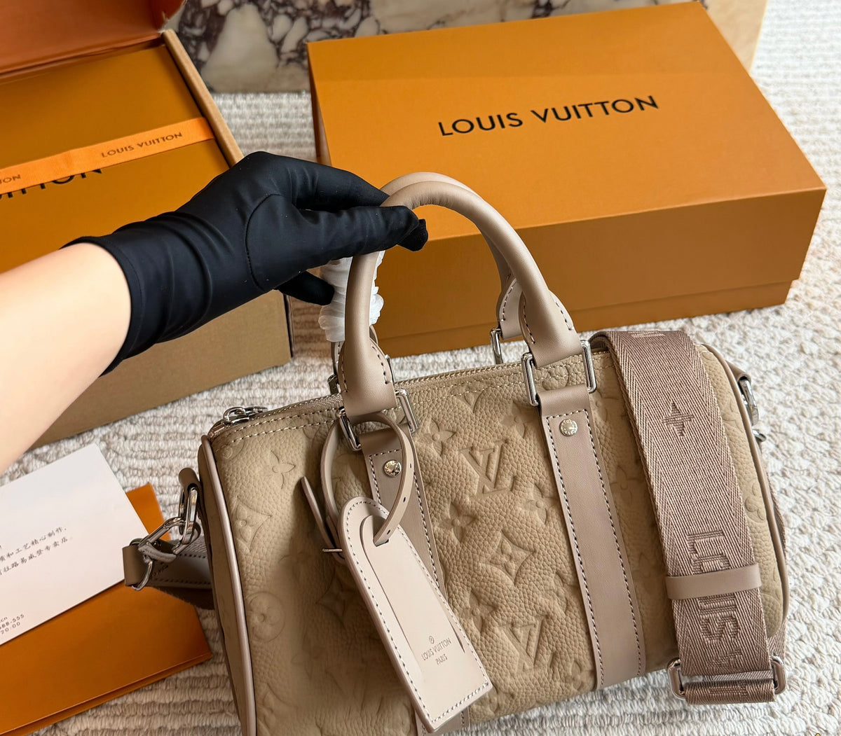 Cuero | Monogram Embossed Boston Bag