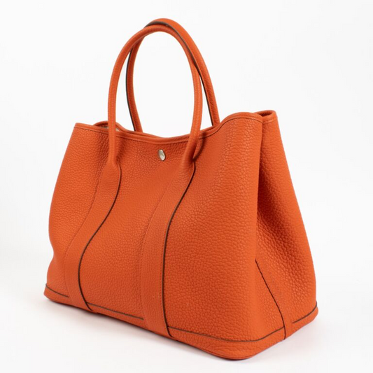 Cuero | Garden Orange Black Silver hardware K stamp