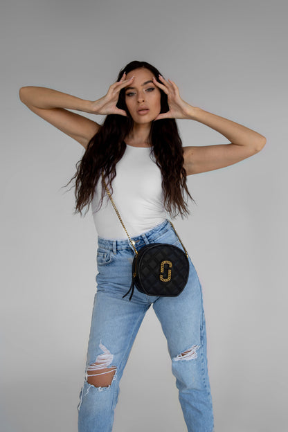 Cuero | The Status round crossbody bag