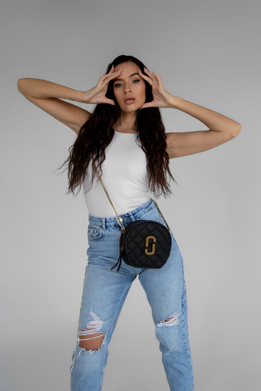 Cuero | The Status round crossbody bag